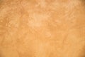 Texture peach background, light colored decorative plaster