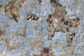 Texture of peeling paint on rusty metal. The steel surface is gray color affected by corrosion. Background with rust on the wall Royalty Free Stock Photo