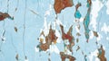 Texture of peeling paint several layers of light blue and brown color spots