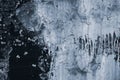 Texture of peeling paint on wall. Black grunge wall with gray paint. Cracked of wall background. Abstract background Royalty Free Stock Photo