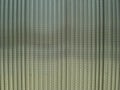 TEXTURE PERFORATED STEEL PLATE AND WAVY Royalty Free Stock Photo