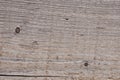 Grey weathered wood texture showing cracks and growth ring