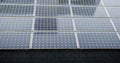 Texture of photovoltaic panels solar panel background, Alternative energy concept,Clean energy,Green energy. on a roof Royalty Free Stock Photo