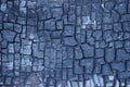 Texture of a piece of black charred wood board Royalty Free Stock Photo