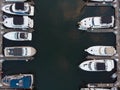 Texture. Pier on the river bank, sea with yachts, with the city top view. Many boats