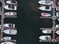 Texture. Pier on the river bank, sea with yachts, with the city top view. Many boats