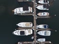 Texture. Pier on the river bank, sea with yachts, with the city top view. Many boats