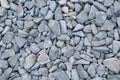 The texture of a pile of gray stone. A high quality