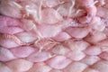 Texture of pink big knit blanket. Large knitting. Plaid merino wool. Top view Royalty Free Stock Photo
