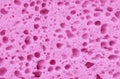 Texture of a pink sponge made of foamed polyurethane Royalty Free Stock Photo