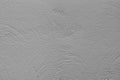The texture of the plastered gray wall. Decorative plaster with rounded stripes technique Royalty Free Stock Photo