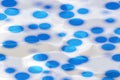 Texture of a plastic surface with blue circles, reflections from lighting Royalty Free Stock Photo