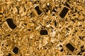 Texture of pure gold with Tourmaline inlays, background for wallpaper, decoration or design works