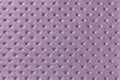 Texture of purple leather background with capitone pattern, macro Royalty Free Stock Photo