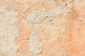 Texture of a red antique wall, destruction of a plaster layer of an old concrete surface, abstract background Royalty Free Stock Photo