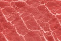 Texture of red meat with white veins patterns