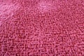 Texture of red velor fabric close up