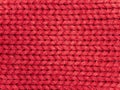 Texture of red woolen knitted fabric Royalty Free Stock Photo