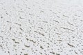 Texture of a relief white tile pendant or hem of a ceiling, perspective view, selective focus Royalty Free Stock Photo