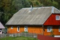 The texture of the roof with shiver slate coating. Rough and old roof of gray slate wavy sheets. Waterproof roofing from asbestos Royalty Free Stock Photo