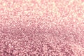 Texture of rose gold glitter fabric as background, closeup Royalty Free Stock Photo