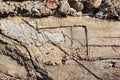 Texture of rough clay stucco with stones