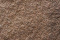 The texture of rough surface of red granite Close-up Royalty Free Stock Photo