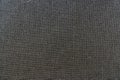 Texture of roughly woven grey fabric for background