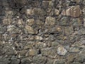 Grey green brickwork of the fortress ruins.