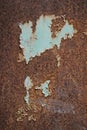 Texture of rustic metal board with peel of blue paint, vertical frame Royalty Free Stock Photo