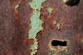 texture of rusty iron, cracked green paint on an old metallic surface, metal surface with a bolt and a keyhole Royalty Free Stock Photo