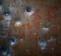 Texture of rusty metal with bullet holes Royalty Free Stock Photo