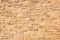 Texture of a sand-colored brick wall