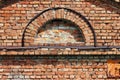texture semi-circular window in the old historic brick building. Royalty Free Stock Photo