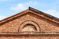 texture semi-circular window in the old historic brick building. Royalty Free Stock Photo