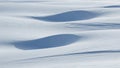 Abstract Snow Dunes with Soft Shadows and Rippled Texture (913 Royalty Free Stock Photo