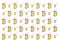 Texture of sign crypto currency of bitcoin in the hand on gold background. Symbol BTC.