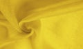 Texture silk fabric, school bus yellow THE BEST IDEAS FOR your projects: elegant and luxurious. There is no need for any special Royalty Free Stock Photo