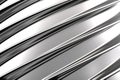 Texture of silver wall metal sheet with wave surface. Metallic plate texture. Diagonal silver grey stripes wallpaper banner design