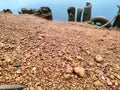 texture of small rocky dirt hill near the river bank