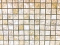 The texture of the small square ceramic brown decorative tiles, mosaics with seams for the bathroom, kitchen. The background Royalty Free Stock Photo