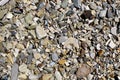 Texture of small stones that are on the beach. Pebble sea shore. Royalty Free Stock Photo