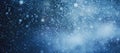 Texture of snow falling from the sky on a dark blue background. Particles cloud screen saver, wallpaper with copy space Royalty Free Stock Photo