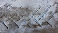 Texture of the snow roads snow and sand trail of the car Royalty Free Stock Photo