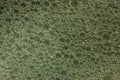 Texture of soap water on a gray-green background