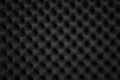 Texture soundproof panel of polyurethane foam. Abstract black rubber foam background