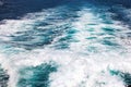 Texture, splashes and waves on the sea. Track on the water from the motor of the boat