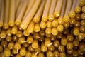 Texture of a stack of yellow church candles