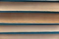 Texture Stacks of old books. Blue hardcover books Royalty Free Stock Photo