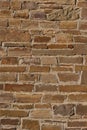 Texture of a stone brown wall of an ancient fortress Royalty Free Stock Photo